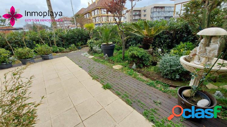 Noja, bajo con jardin en ris primera linea 3