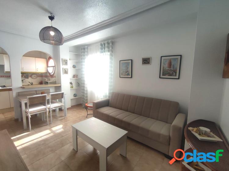 APARTAMENTO CON VISTAS DESPEJADAS Y PISCINA COMUNITARIA 1