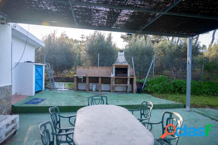 PARCELA CON CASA JUNTO A MONTECASTILLO 1