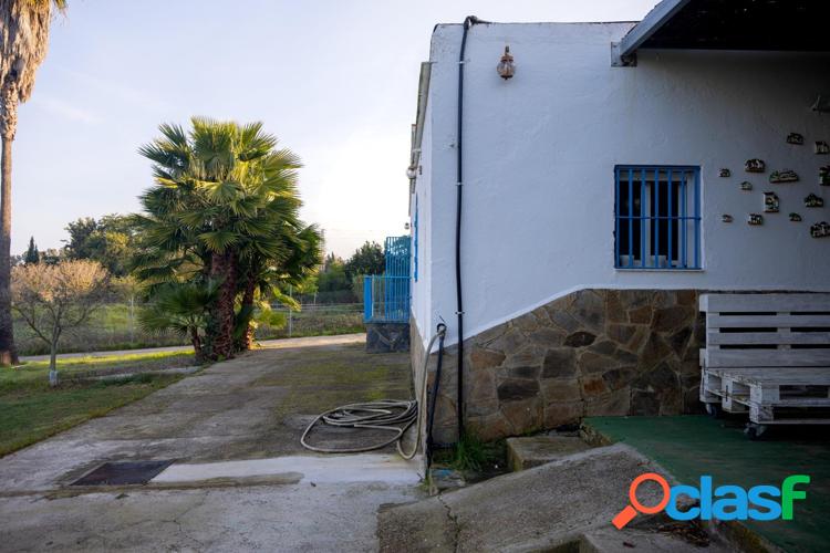 PARCELA CON CASA JUNTO A MONTECASTILLO 2